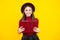 Happy teenager portrait. Teen girl pupil hold books, notebooks, isolated on yellow background, copy space. Back to