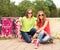 Happy teenagers outdoors. Summer. Girl friends having fun together with skate board. Urban lifestyle.