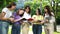 Happy Teens girls Studying Together Outdoors, Enjoying Life. Students books