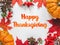 Happy Thanksgiving. Bright pumpkins, leaves and red berries