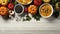 Happy Thanksgiving concept. Composition with ripe orange pumpkins, fallen leaves, dry flowers on rustic wooden table