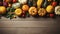 Happy Thanksgiving concept. Composition with ripe orange pumpkins, fallen leaves, dry flowers on rustic wooden table