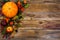 Happy Thanksgiving decor with fall leaves on wooden background