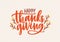 Happy Thanksgiving festive phrase handwritten with beautiful cursive calligraphic font and decorated by branches or