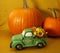 Happy thanksgiving, green truck, sunflower delivery, orange pumpkins