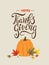 Happy Thanksgiving greeting card. Vintage card design with lettering and pumpkin illustration near colorful autumn leaves