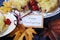 Happy Thanksgiving table setting with cherry apple crumble pie - closeup.