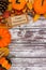 Happy Thanksgiving tag with autumn corner border on old white wood