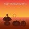 Happy Thanksgiving. The turkey sits on a pumpkin.