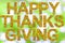 Happy Thanksgiving written with words made of leaves and green