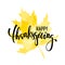 Happy thanksgiving on yellow watercolor maple leaf. Hand drawn calligraphy and brush pen lettering. design for holiday greeting ca