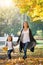 Happy time family and love abstract: mother and daughter run in autumn park