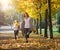 Happy time family and love abstract: mother and daughter run in autumn park