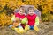 Happy toddler children under an umbrella