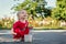 Happy toddler draws with chalk