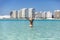 Happy tourist on blue seagull beach in Cancun city in Riviera Maya of Mexico. Turquoise caribbean beach.