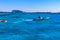 Happy tourists having fun riding inflatable boat at the Red sea