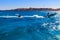 Happy tourists having fun riding inflatable boat at the Red sea