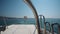 Happy tourists parasailing on beach in summer, parachute hanging mid air