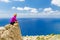 Happy trail runner looking at inspirational landscape view