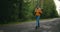 Happy Traveler With Backpacks Begins Their Journey In The Autumn Sunny Forest