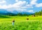 Happy traveler girl in mountainous valley