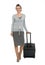 Happy traveling woman with suitcase making step fo