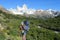 Happy trekker girl near Fitz Roy mountail in El Chalten