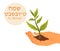 Happy Tu Bishvat on Hebrew. Hand holding Green sprout Concept.