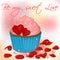 Happy Valentine`s Day card with cupcake, pearls and rose petals.