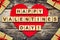 Happy Valentine`s Day, an inscription composed of the alphabet on wooden cubes. On a wooden background