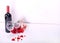 Happy Valentine`s Day with red wine, red roses, wine glasses and hearts in love