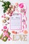 Happy Valentine`s day. Roses flowers, LOVE text, hearts, gifts and decorative items in pink pastel colors. February 2021 calendar