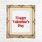 Happy Valentine\'s Day word in golden vintage photo frame on white brick wall,Love concept.