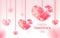 Happy Valentine\'s Day word with hanging pink polygon heart on bl