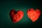 Happy valentines day. Beautiful luminous hearts in the center against a green gradient. The concept of love, february