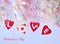 Happy valentines day red hearts hanging on pink leaves purple background With spaces to fill words