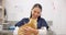 Happy, vet and woman with pet cat for care in healthcare clinic or hospital. Veterinary, kitty and Asian medical