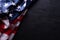 Happy Veterans Day. American flags veterans against a blackboard background