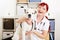 Happy veterinarian with dog