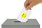 Happy vote concept slipped into a ballot box