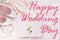 Happy Wedding Day card sign text flat lay,accessories in biege pink colors on white background,copy space.Bridal details