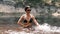 Happy Wet Woman in Bikini Bathes with Splashes, Waves in the River. Slow motion