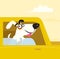 Happy white dog travelling in yellow car