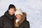 Happy winter interracial couple outdoors portrait