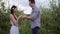 Happy woman accepting marriage proposal from man
