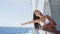Happy woman in bikini cheering joyful enjoying cruise ship travel vacation