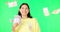 Happy woman, cash and money rain on green screen for winning, prize or lottery against a studio background. Portrait of