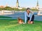 Happy woman with chihuahua in park