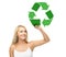 Happy woman drawing green recycle symbol